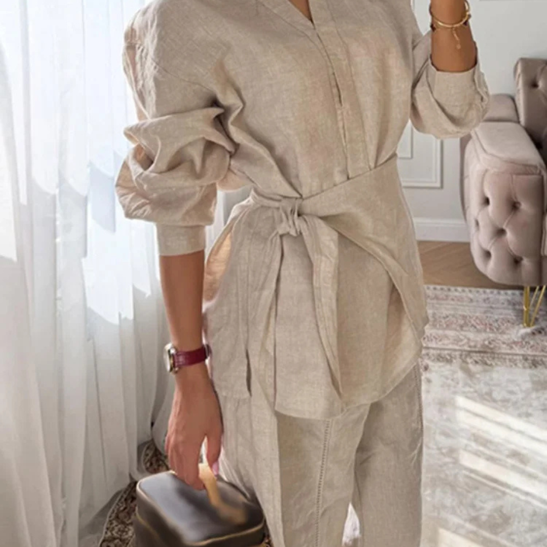 Person wearing a Apricot Alessia Elevated 2-Piece Set linen outfit in a bright room with white curtains.