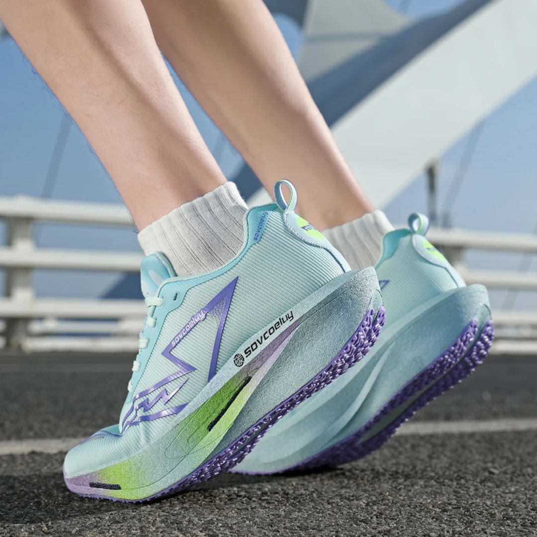 Blue Purple Apex Forge Lightweight Marathon Sneakers with visible brand logo on a blurred outdoor background
