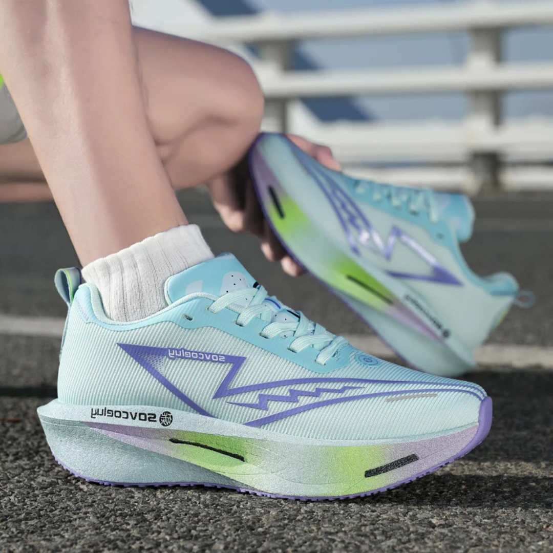 Blue Purple Apex Forge Lightweight Marathon Sneakers worn by a person on a track.