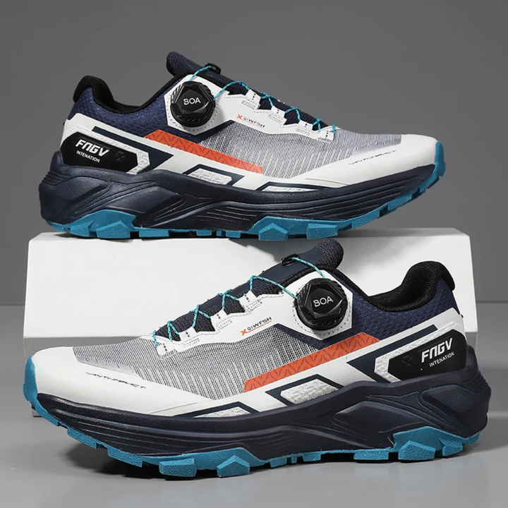 Pair of athletic shoes with dark blue design on a gray background