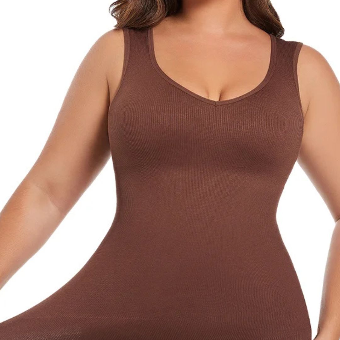 Brown tank top worn by a person on a white background