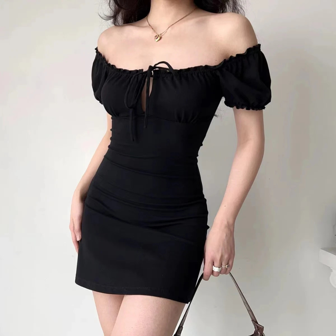 Person wearing Camilla Sultry A-Line Dress in a neutral background.