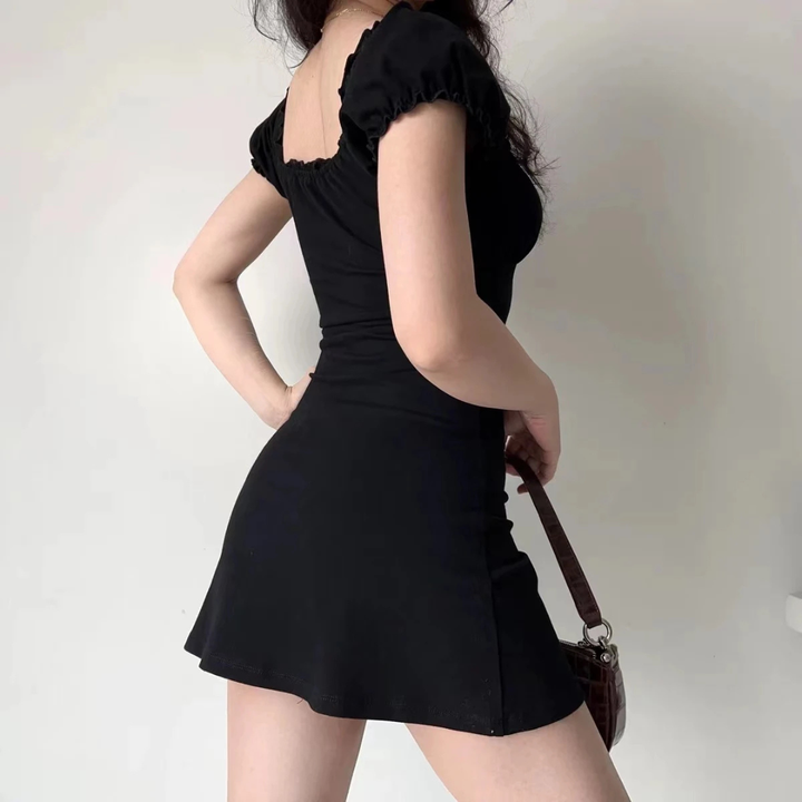 Person wearing Camilla Sultry A-Line Dress in a neutral background.