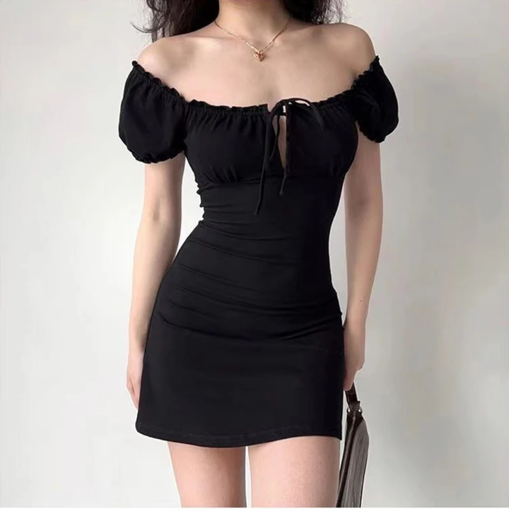 Person wearing Camilla Sultry A-Line Dress in a neutral background.