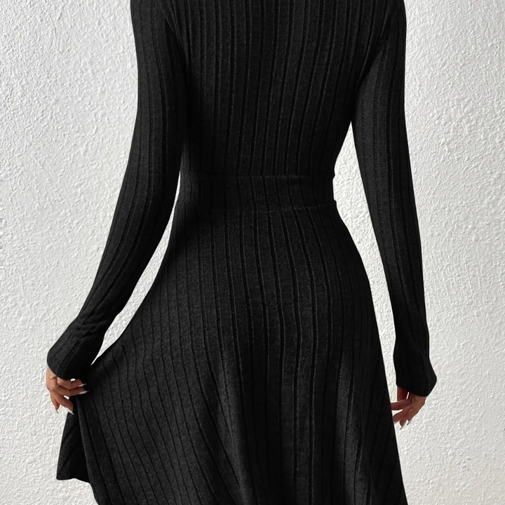 Faustina Sleek Knit Black Dress on a neutral background