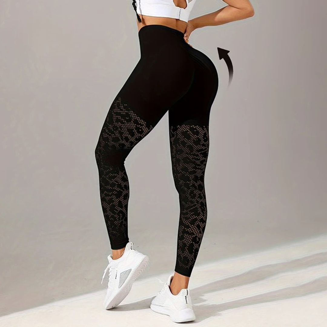 Black patterned leggings worn by a person on a plain background
