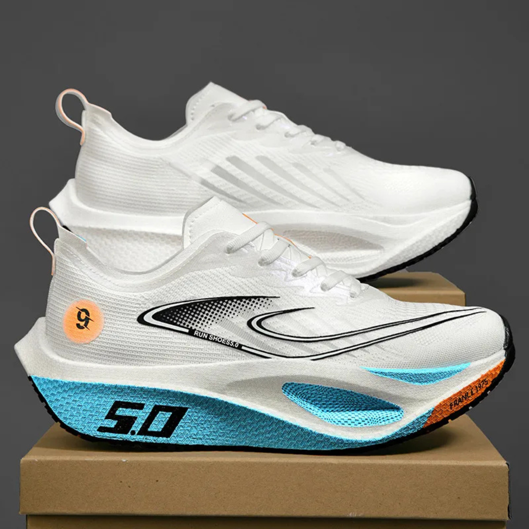 White Kryza Aero Pulse Marathon Sneakers on a cardboard box against a dark background