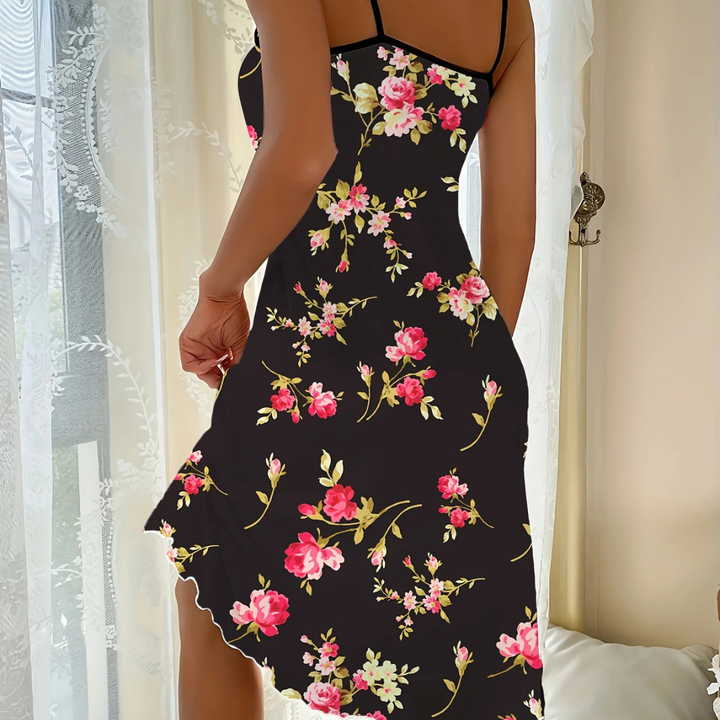 Black Lilith Bloom Halter Floral Dress worn by a person, standing against a neutral background.