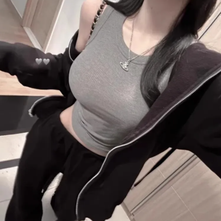 Person wearing Gray Liora Slim Tank Top in a neutral background.