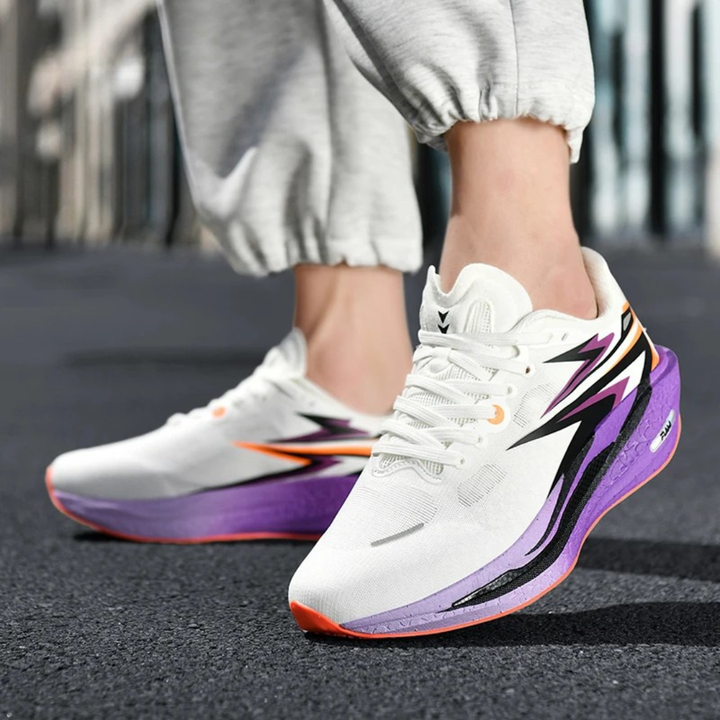 Purple Orion Thunder Run Carbon Racing Shoes on a blurred street background