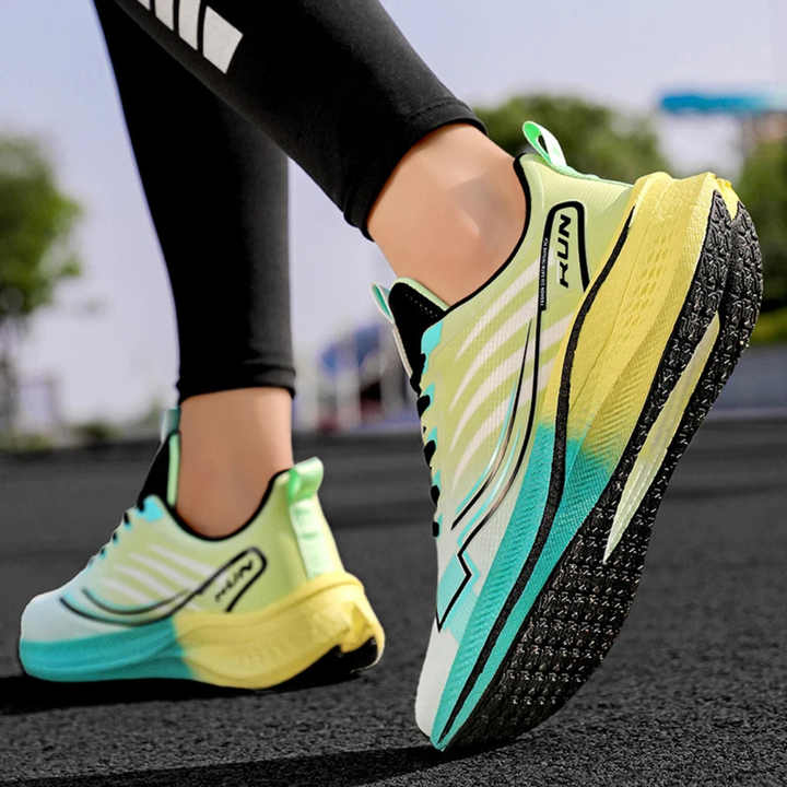 Person wearing green Phantom Stride Carbon Running Shoes on a road with blurred background