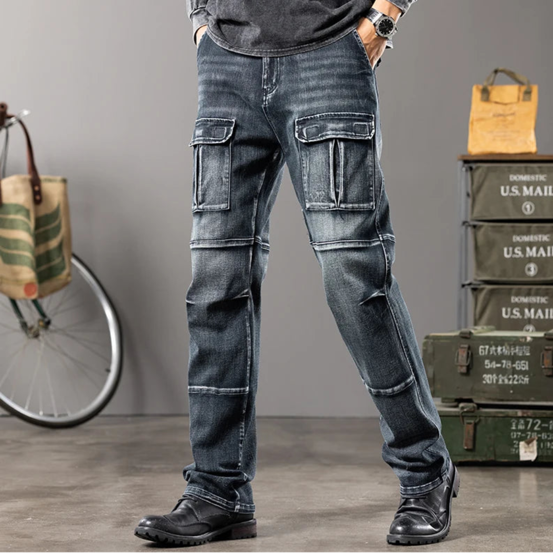 Person wearing rugged blue jeans with cargo pockets in a casual setting with bicycles and mail boxes.