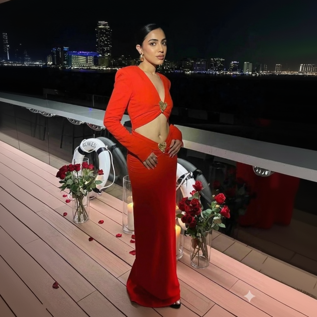 Red reign metal heart long dress for women, bold statement maxi dress with metallic detail for evening and party styling