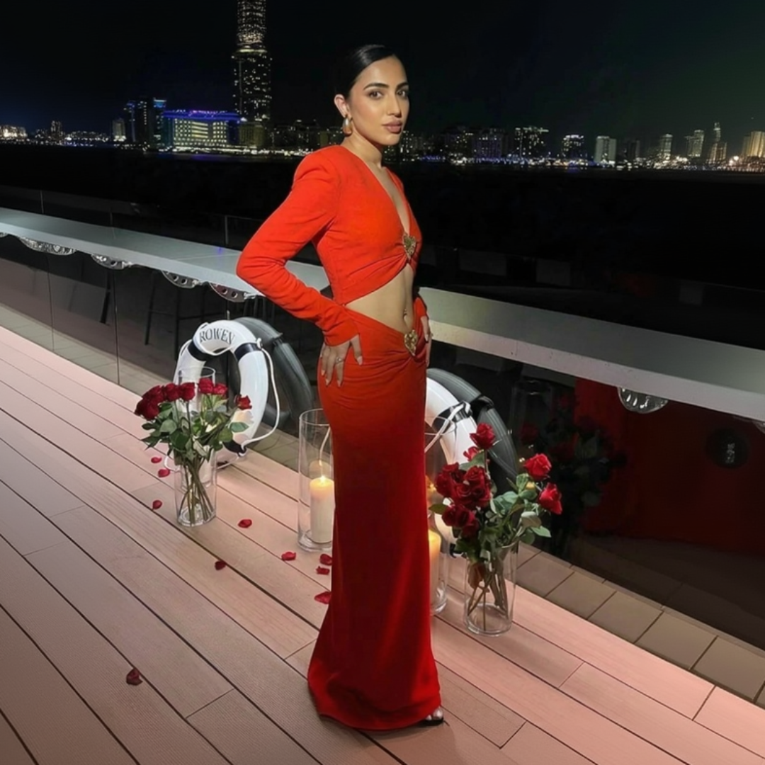 Red reign metal heart long dress for women, bold statement maxi dress with metallic detail for evening and party styling